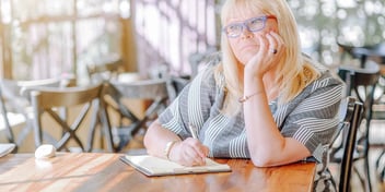 women anxiously thinking about her spouse not responding to her divorce petition