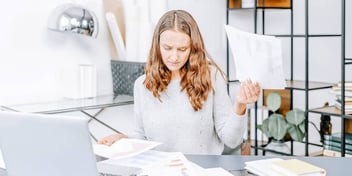 woman completing her divorce paperwork online and at home