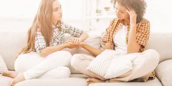 friend giving another friend a pep talk during a difficult time