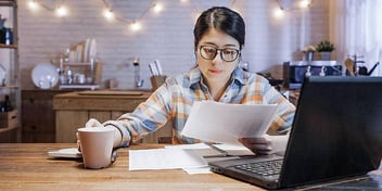 woman planning and doing paperwork