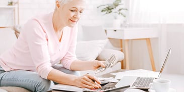 woman doing financial calculations