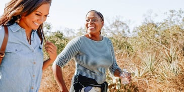 Woman on a hike outside with her friend