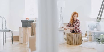 woman moving out of home