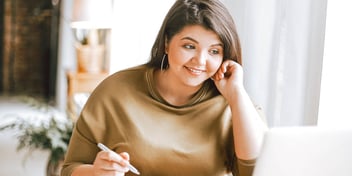 woman smiling and planning her future