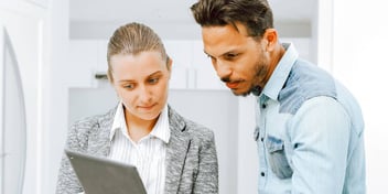woman explaining divorce financial matters to a man