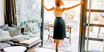 woman looking out the window wondering if she will ever meet the one