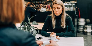 Woman talks to a friend about potential spousal support