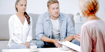 man listens to options about getting a divorce by default