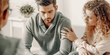 Young caucasian couple in a therapy session.