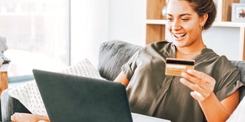 woman paying bills online
