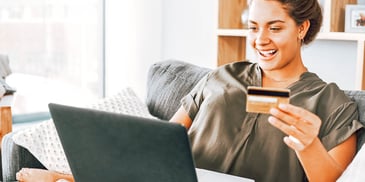 woman paying bills online